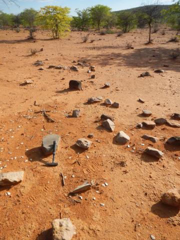 Grindstone on surface scatter